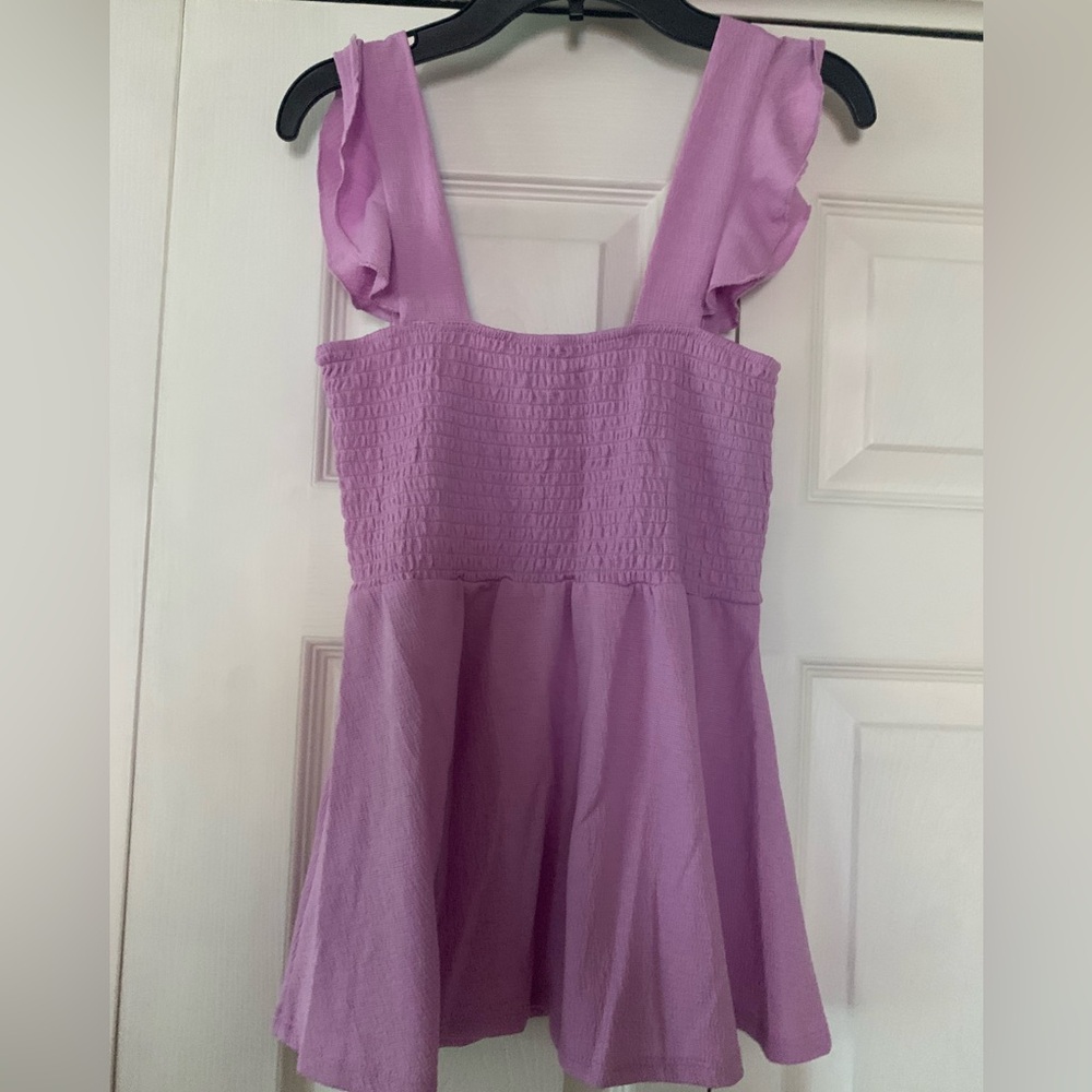 Femininity at its best!  Lavender top with flutter straps and smocking at top—-